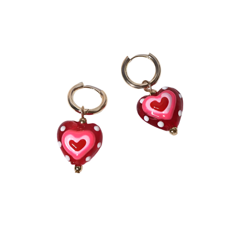 Heart-shaped earrings with red and pink colors on a white background