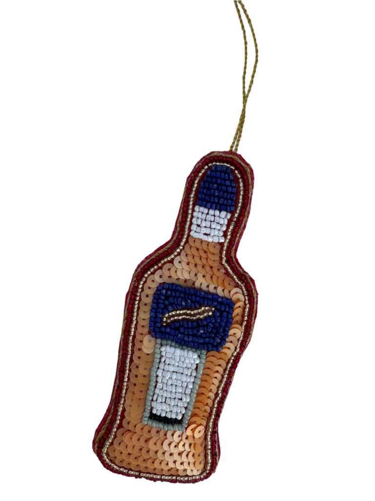 Decorative bottle-shaped ornament with beadwork on a white background